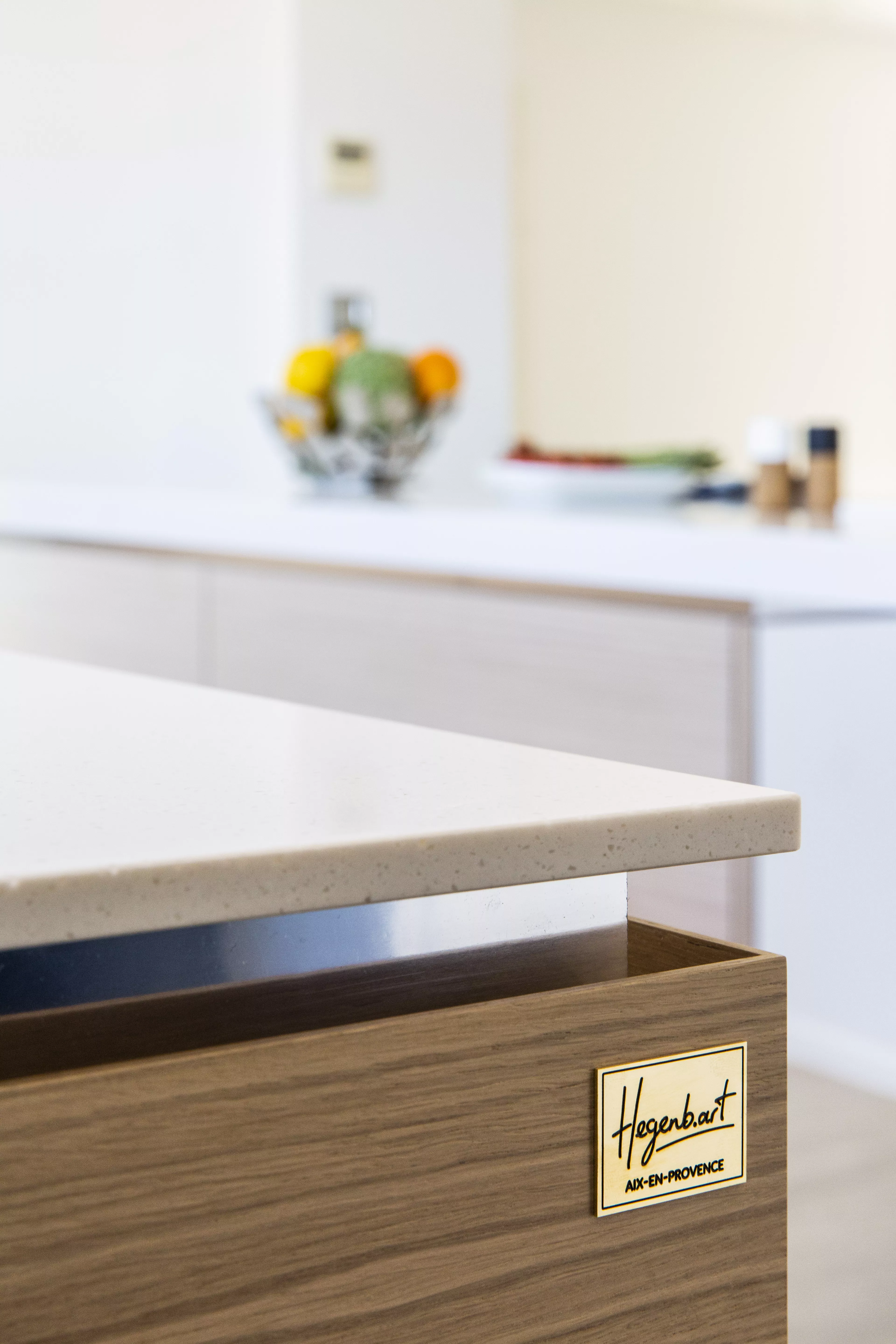 A contemporary, light-filled HIMACS kitchen with a mountain view