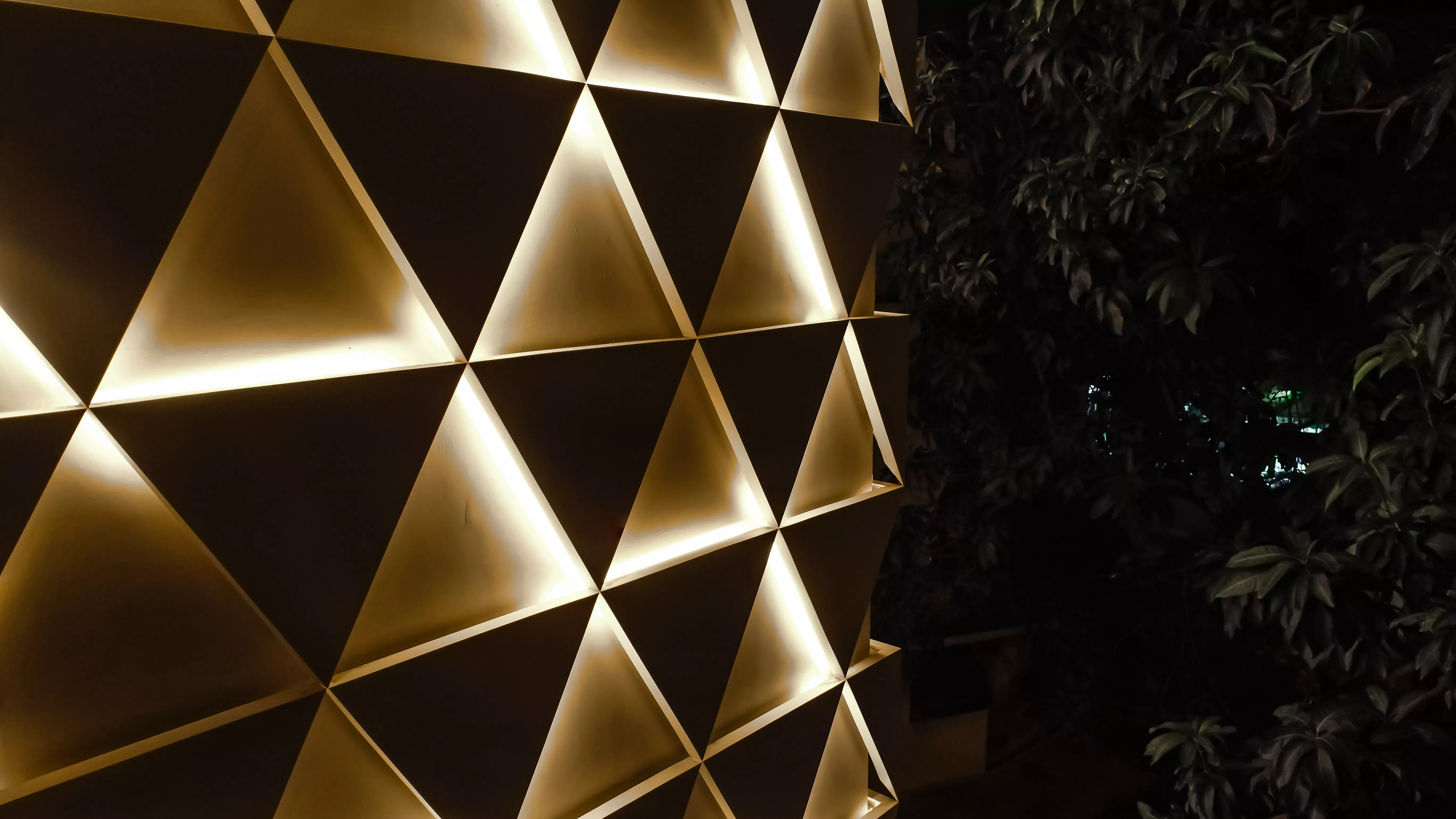 A sculptural, geometric façade made of HIMACS for JK House