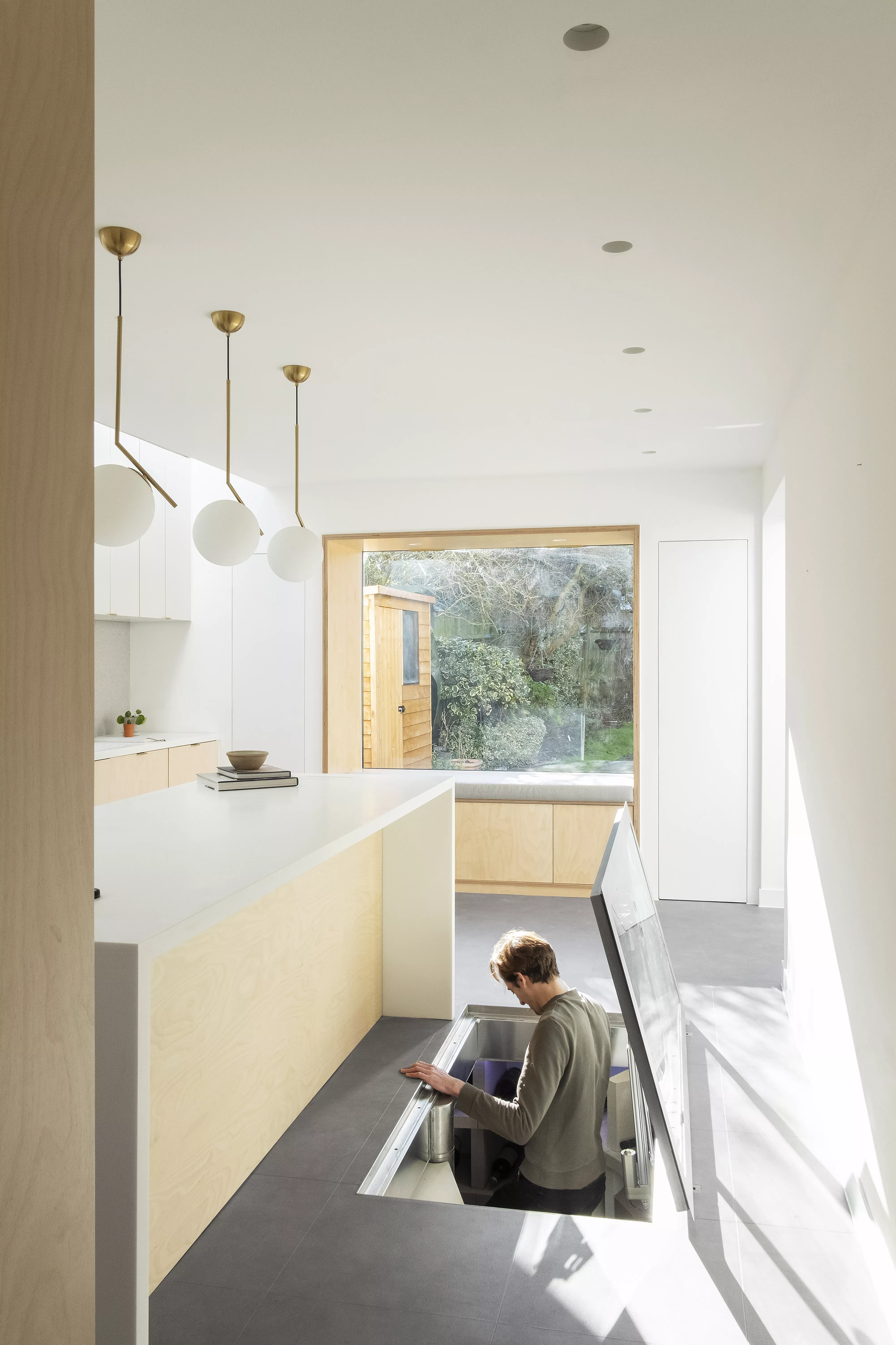 A dreamy minimalist kitchen with HIMACS elements in the Nook House