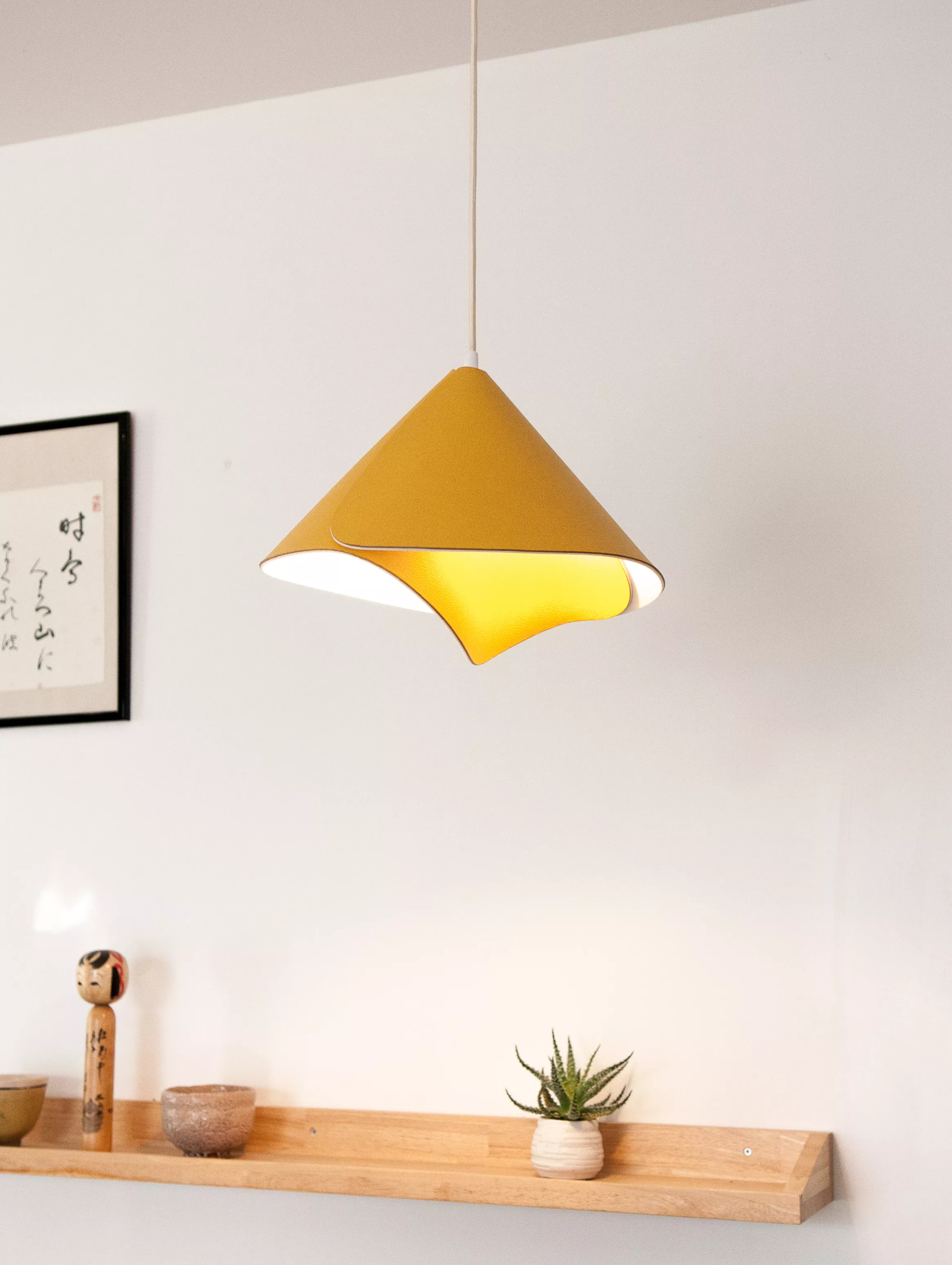 The return of the iconic Tulip lamp, with an elegant new pendant version