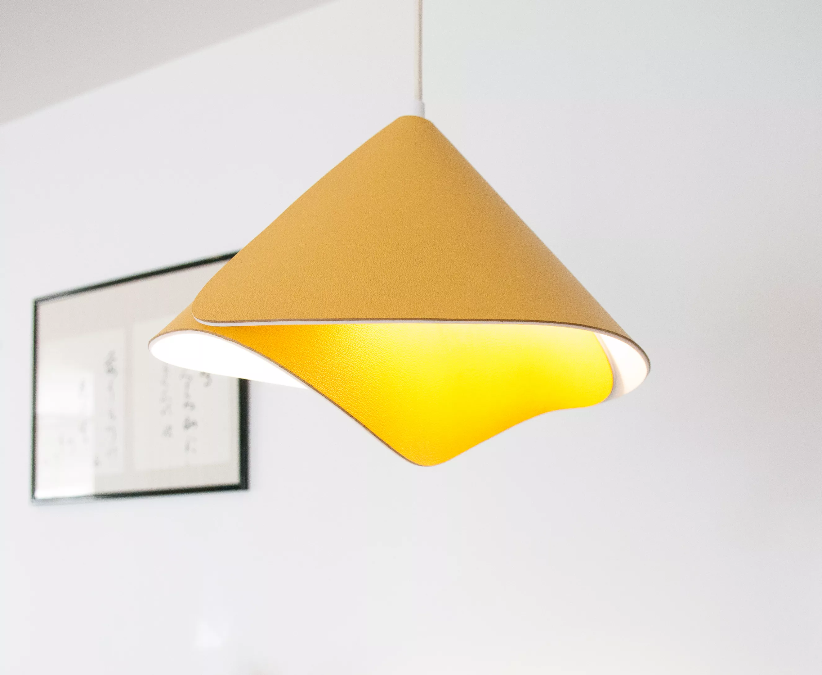 The return of the iconic Tulip lamp, with an elegant new pendant version