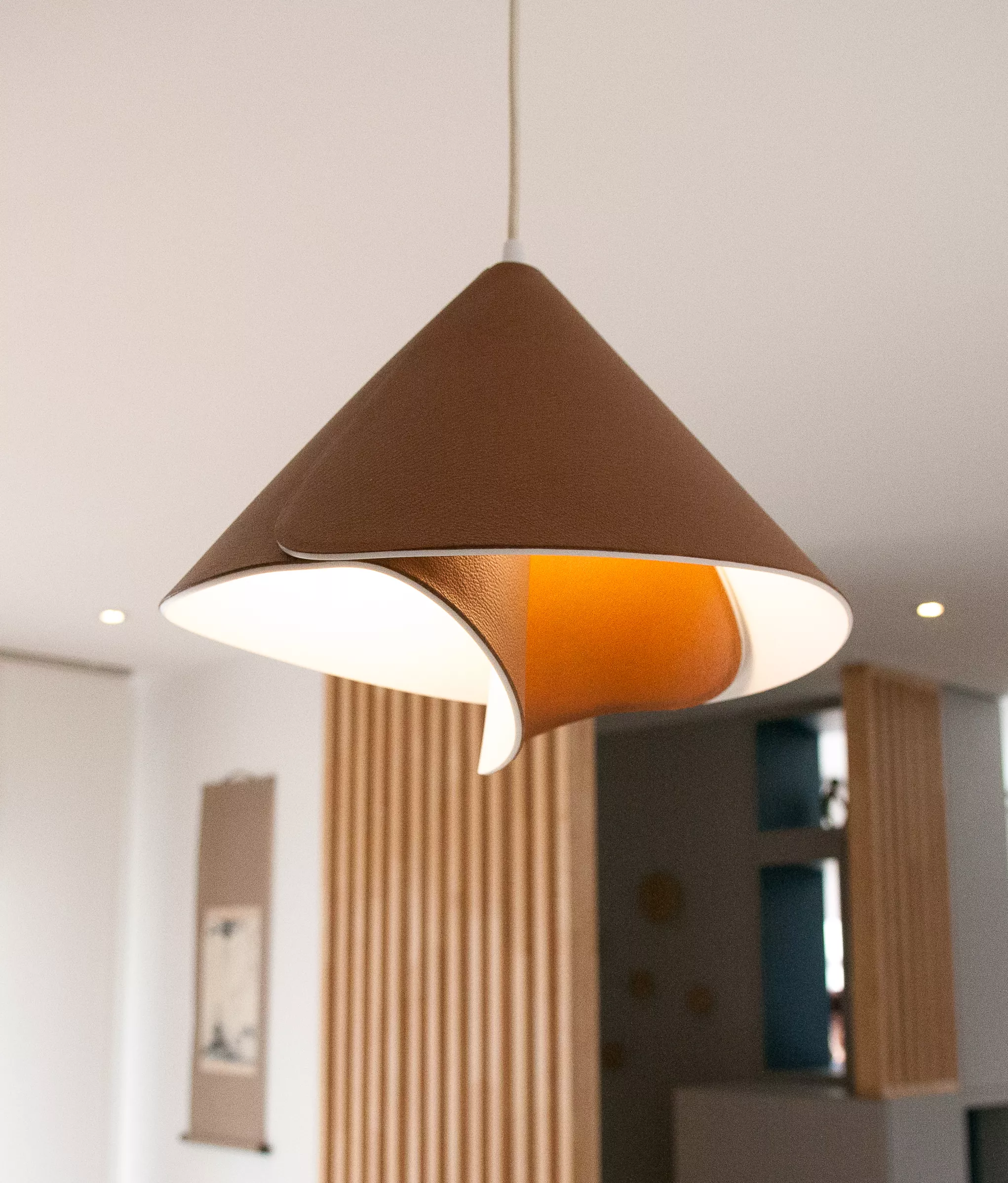 The return of the iconic Tulip lamp, with an elegant new pendant version