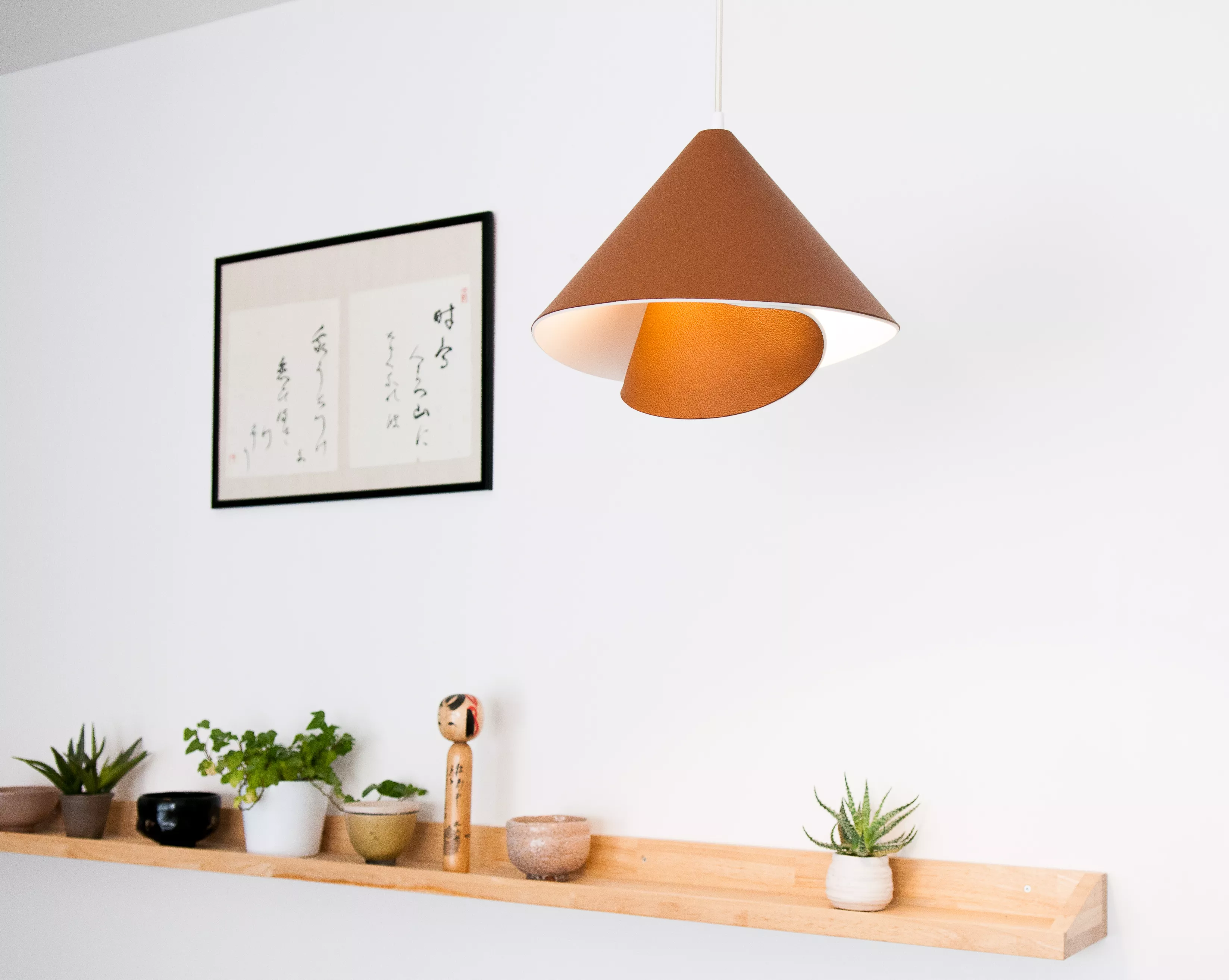 The return of the iconic Tulip lamp, with an elegant new pendant version