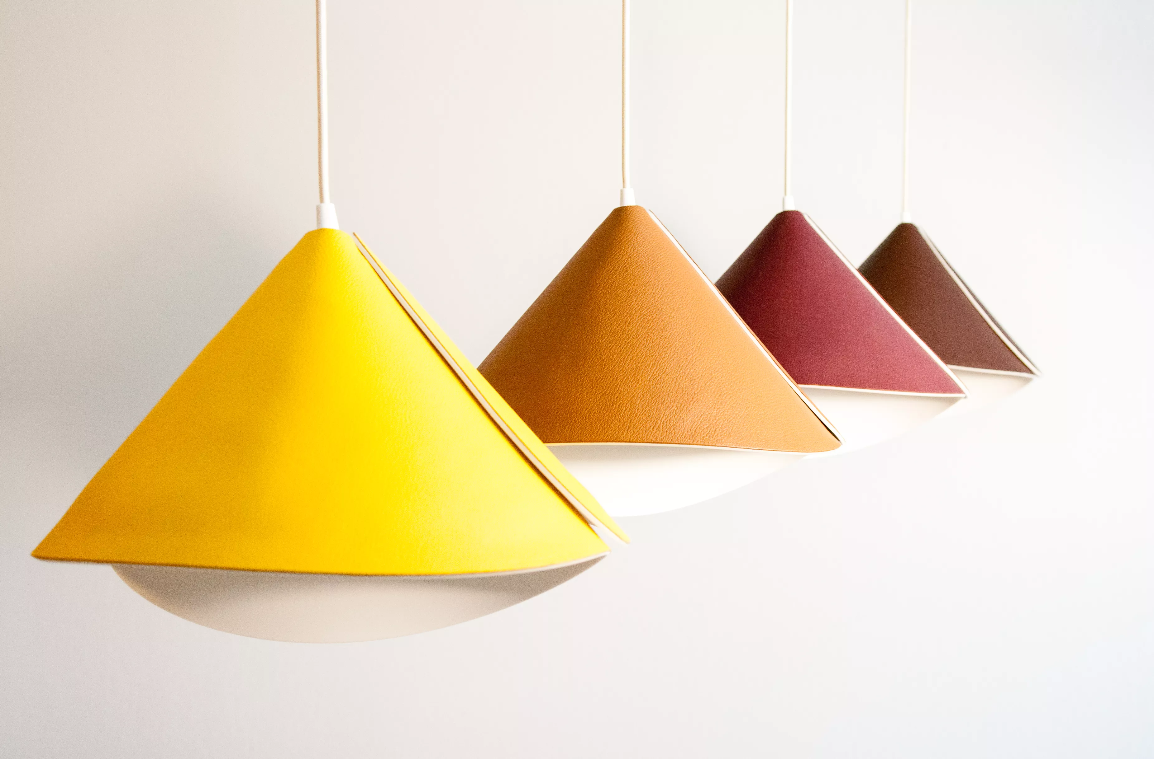 The return of the iconic Tulip lamp, with an elegant new pendant version